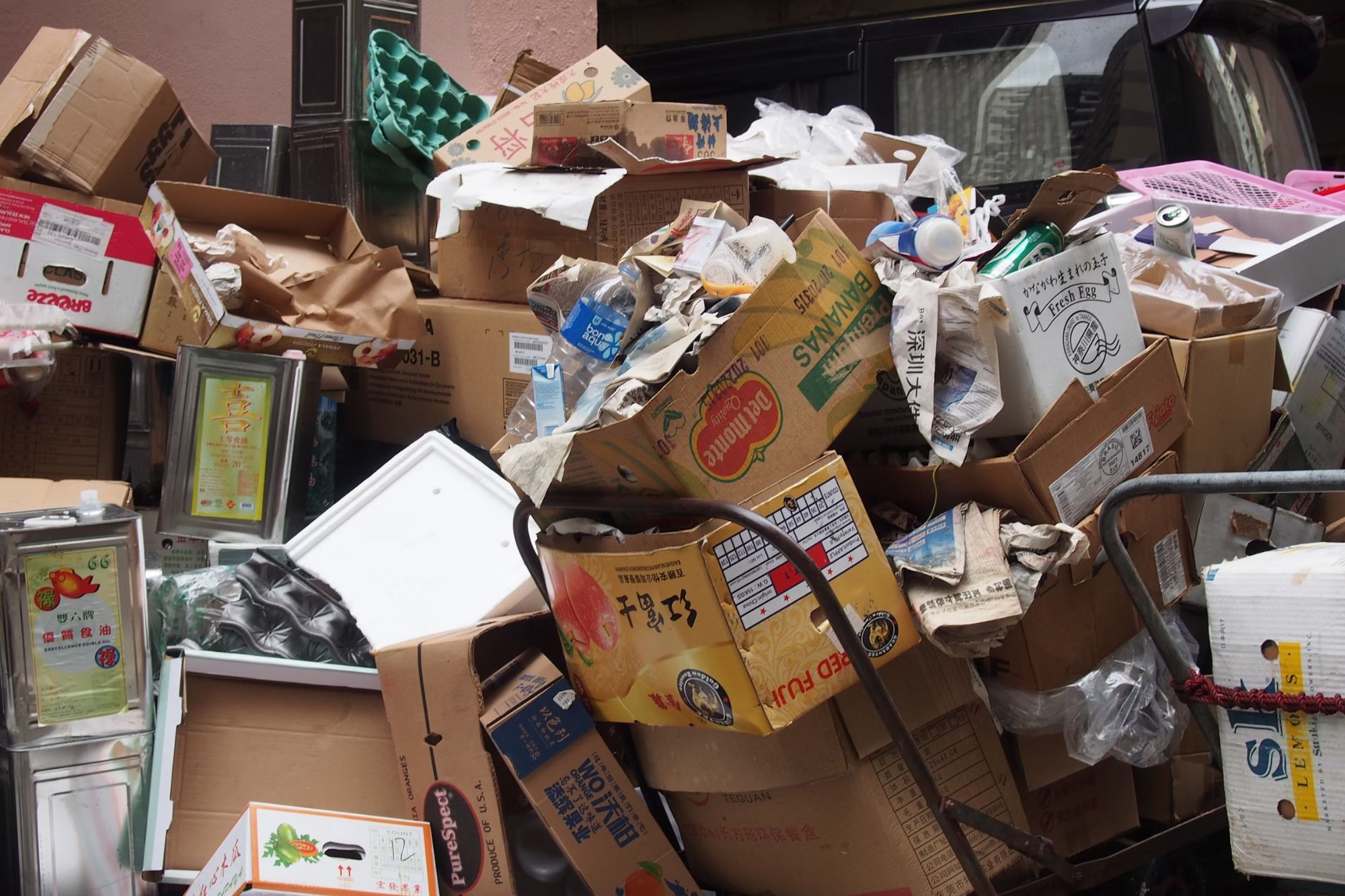 A group of boxes piled together, associated with a clean-out service in Austin, TX.